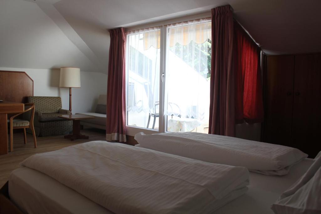 Postel nebo postele na pokoji v ubytování Hotel Annabell