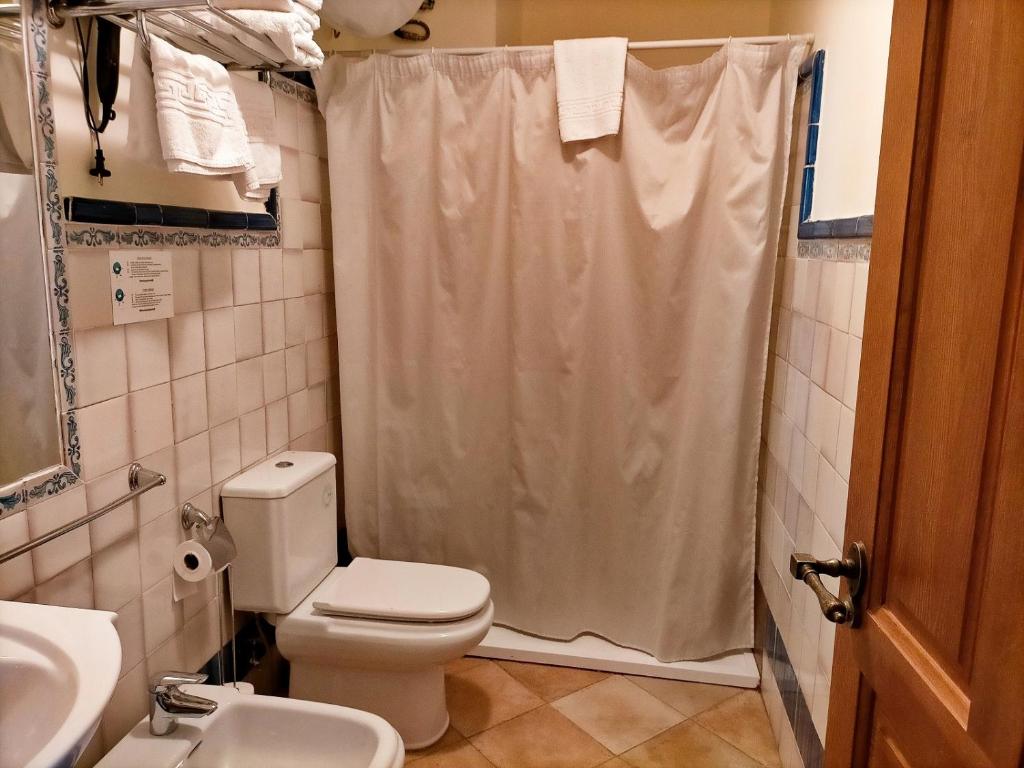Koupelna v ubytování Abadia Suites