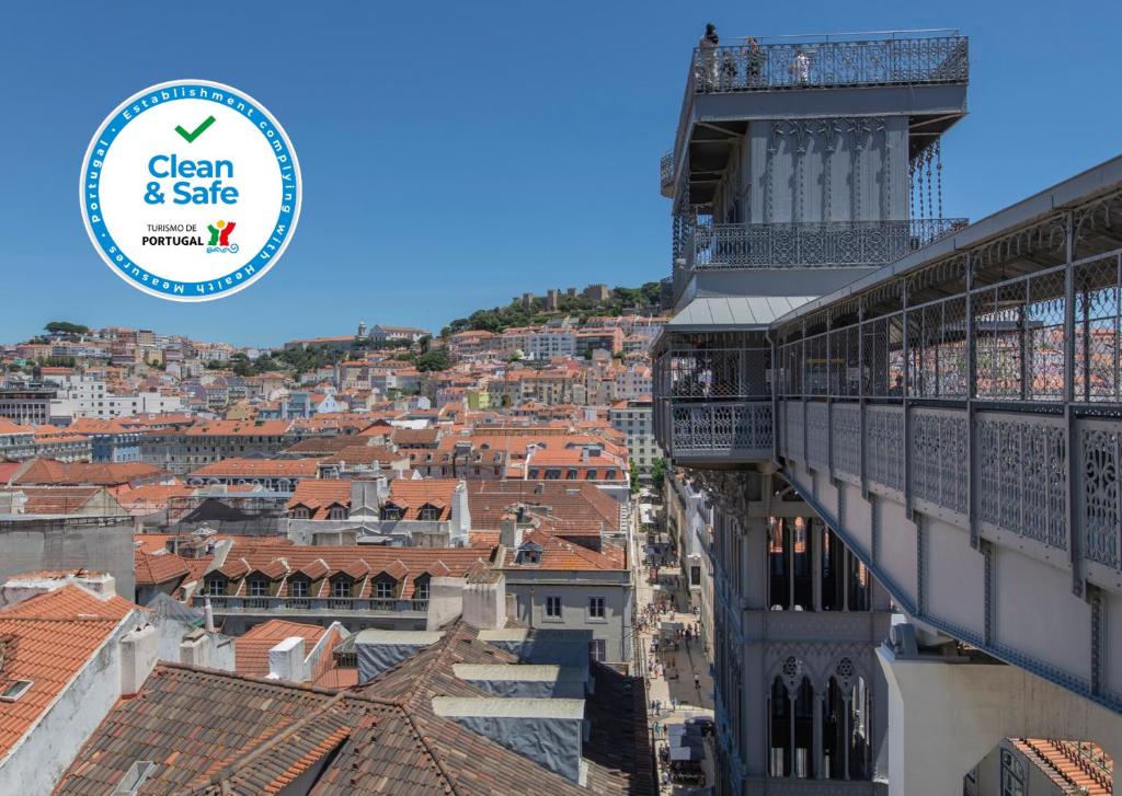 a view of the city from the top of a building at Downtown Apartment Santa Justa in Lisbon