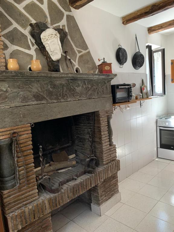Kuchyň nebo kuchyňský kout v ubytování Casa di Giulietta