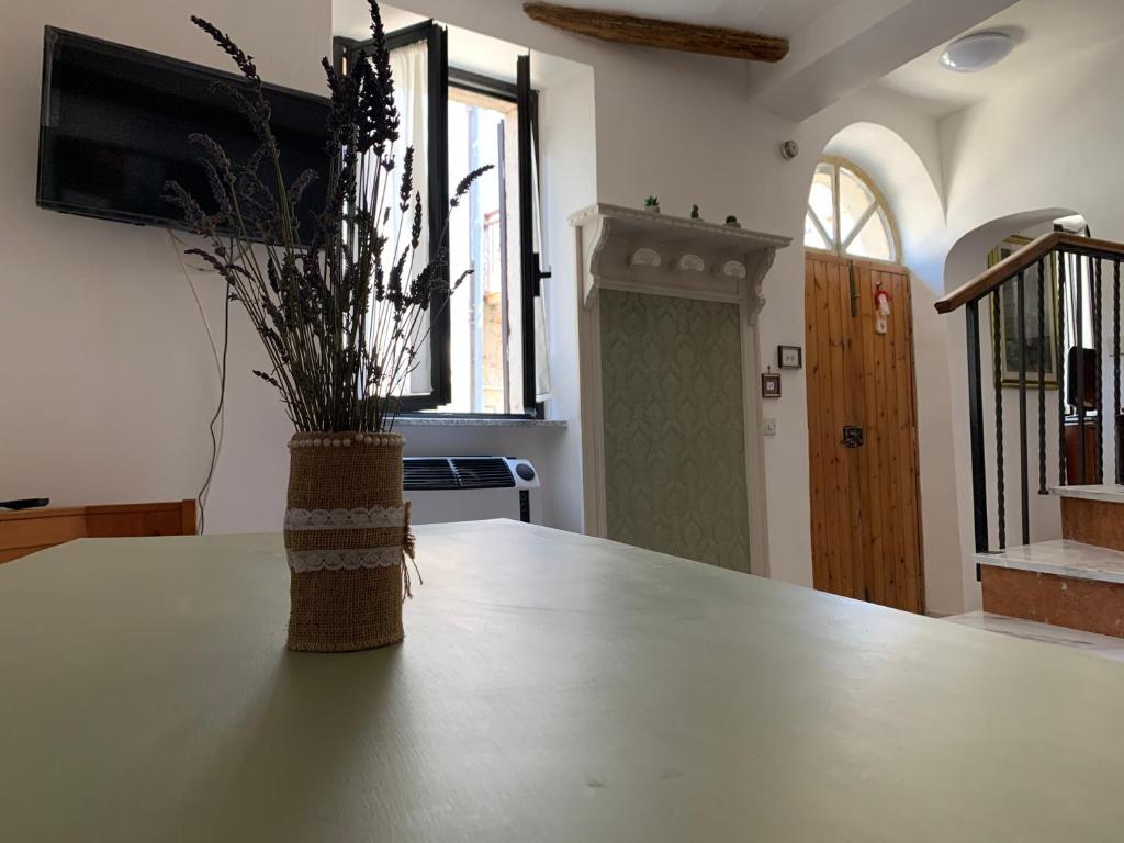 TV a/nebo společenská místnost v ubytování Casa di Giulietta