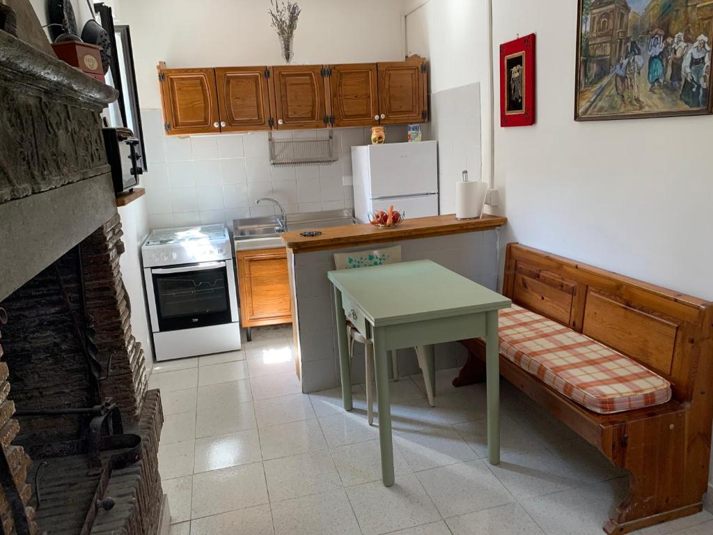 Kuchyň nebo kuchyňský kout v ubytování Casa di Giulietta