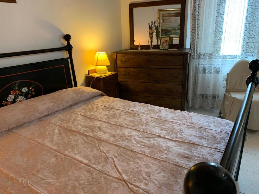 Postel nebo postele na pokoji v ubytování Casa di Giulietta