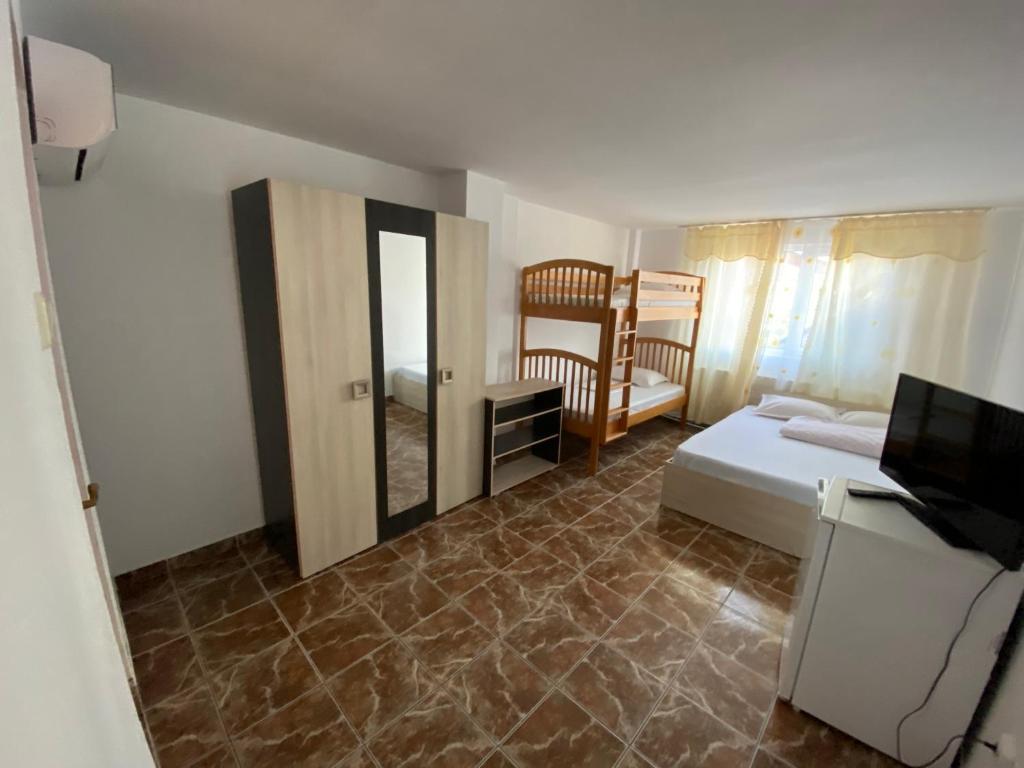 Postel nebo postele na pokoji v ubytování Casa Ciobi