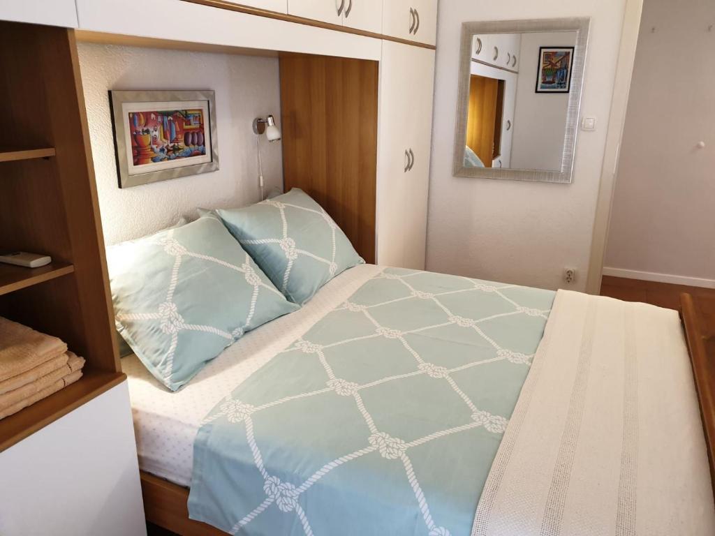 Posteľ alebo postele v izbe v ubytovaní Apartments Kuzmanic