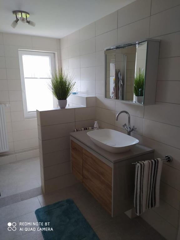 Koupelna v ubytování Ferienhaus Middenin
