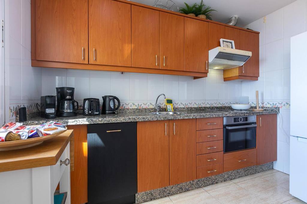 Kuchyňa alebo kuchynka v ubytovaní Two bedroom penthouse in Torremuelle Benalmádena