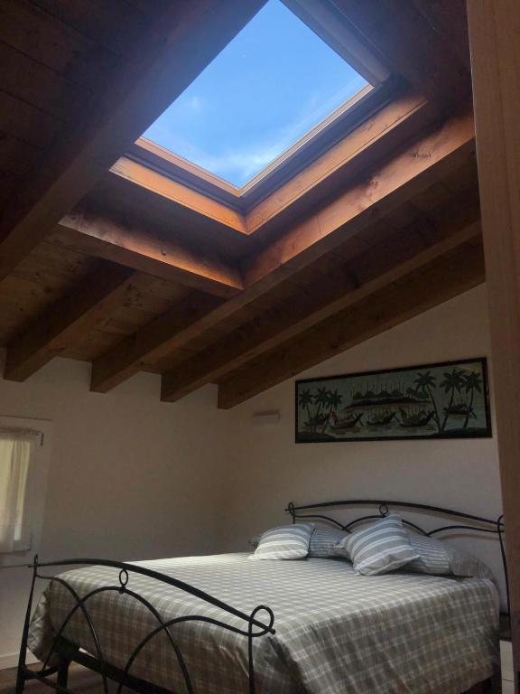 Postel nebo postele na pokoji v ubytování B&B Stella Alpina