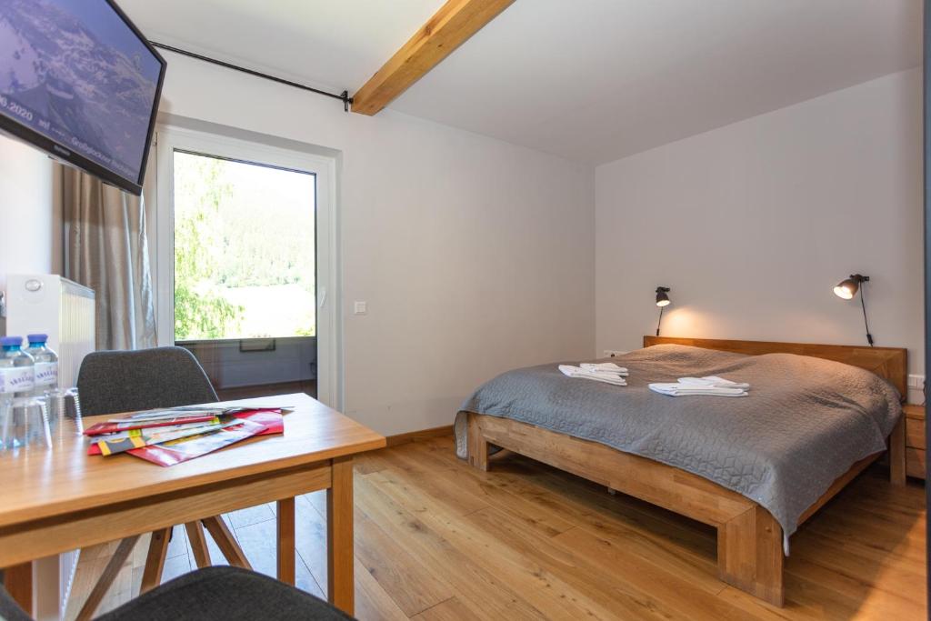 Posteľ alebo postele v izbe v ubytovaní Landhaus Lungau