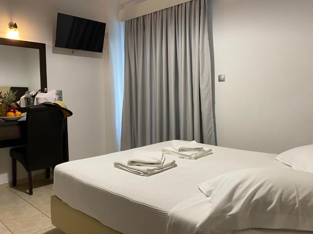 Postel nebo postele na pokoji v ubytování OCEANA Beach Hotel