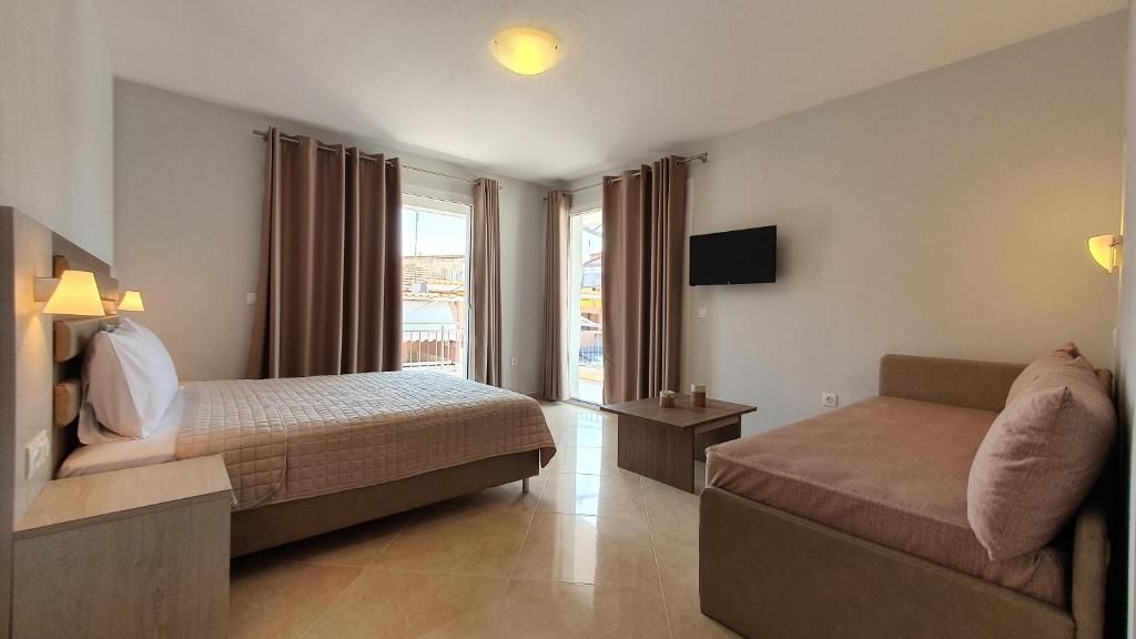 Posteľ alebo postele v izbe v ubytovaní Vasiliki House