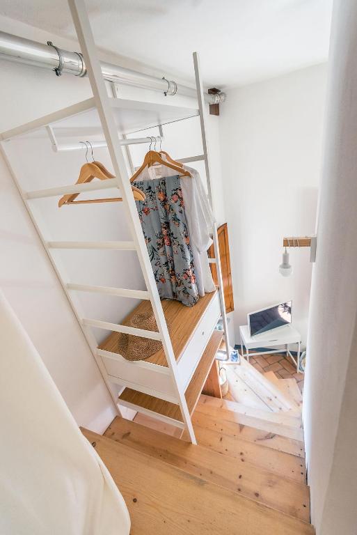 Łóżko lub łóżka w pokoju w obiekcie LUI Tuscany Loft