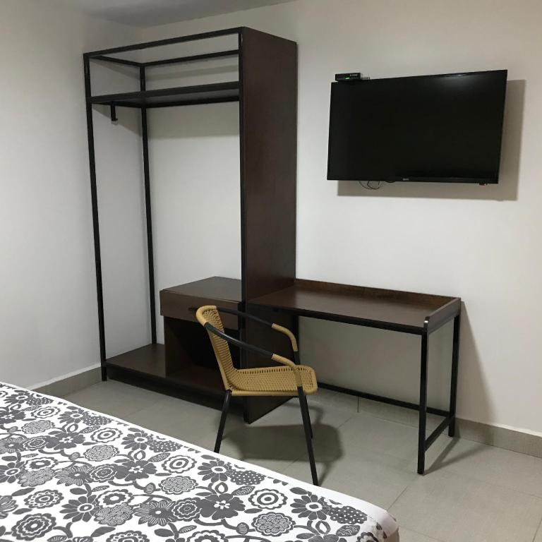 TV a/nebo společenská místnost v ubytování Hotel Jar8 Acuario enfrente al Acuario de Veracruz