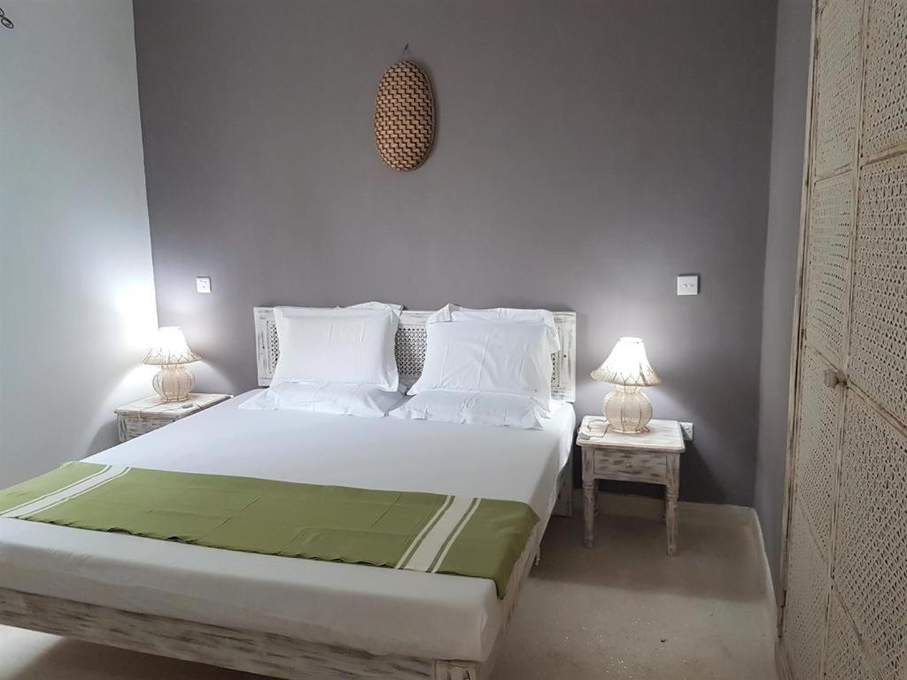 Postel nebo postele na pokoji v ubytování Life Resort St. Thomas Royal Palm