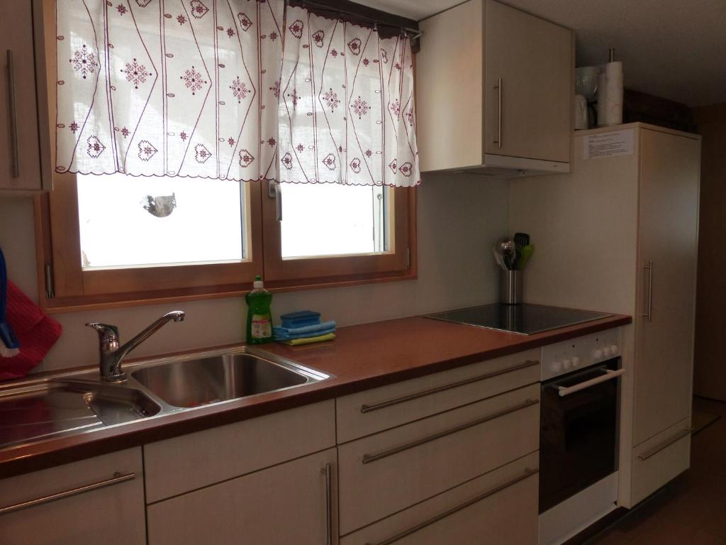 Kuchyň nebo kuchyňský kout v ubytování Chalet Samson