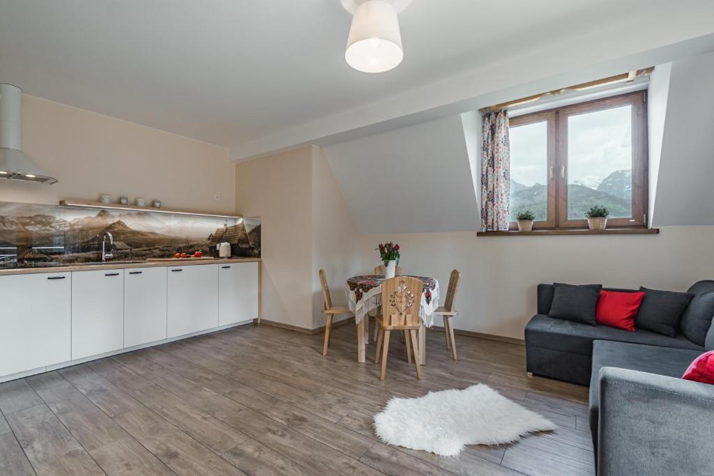 Kuchyňa alebo kuchynka v ubytovaní Widokówka Tatry Pokoje i Apartamenty