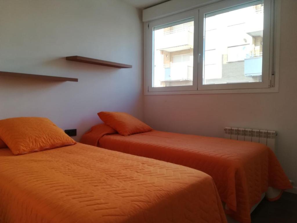 Postel nebo postele na pokoji v ubytování Calafell Espriu 2
