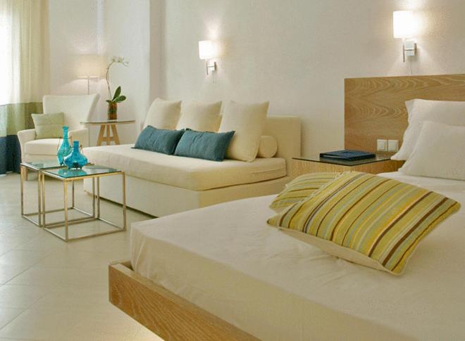 Postel nebo postele na pokoji v ubytování Petasos Beach Resort & Spa - Small Luxury Hotels of the World