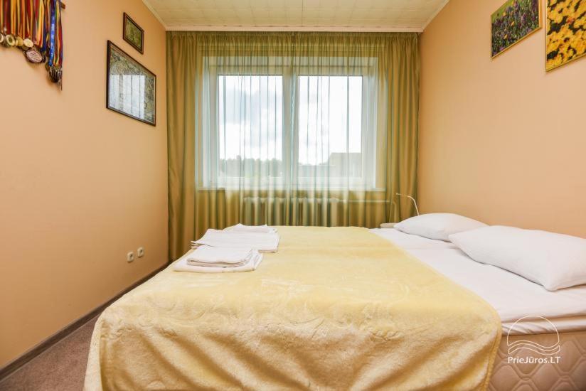 Postel nebo postele na pokoji v ubytování Forest