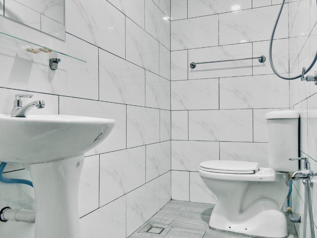 Koupelna v ubytování Hotel Eco Desaru