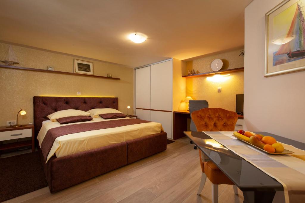 Posteľ alebo postele v izbe v ubytovaní Studio apartment Oleander