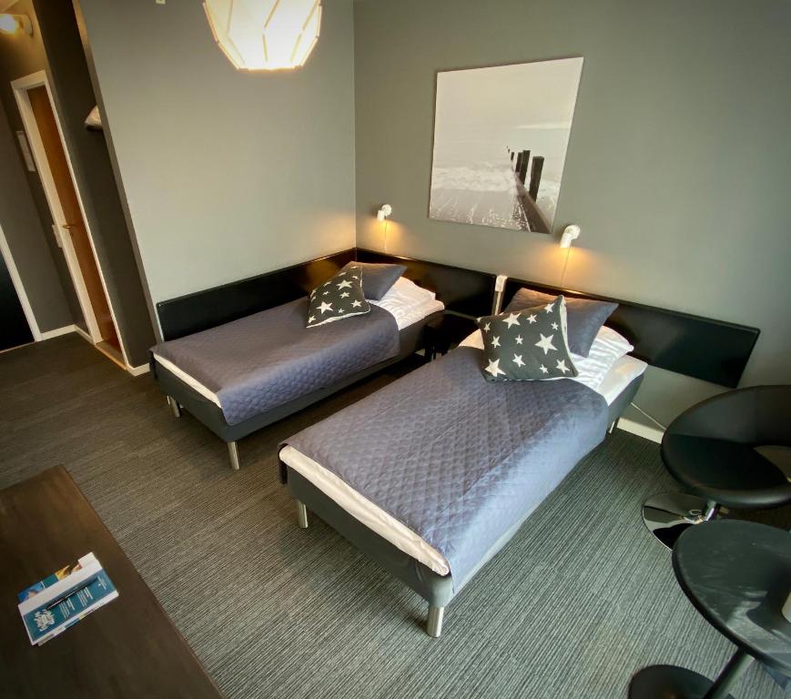 Postel nebo postele na pokoji v ubytování Taastrup Park Hotel