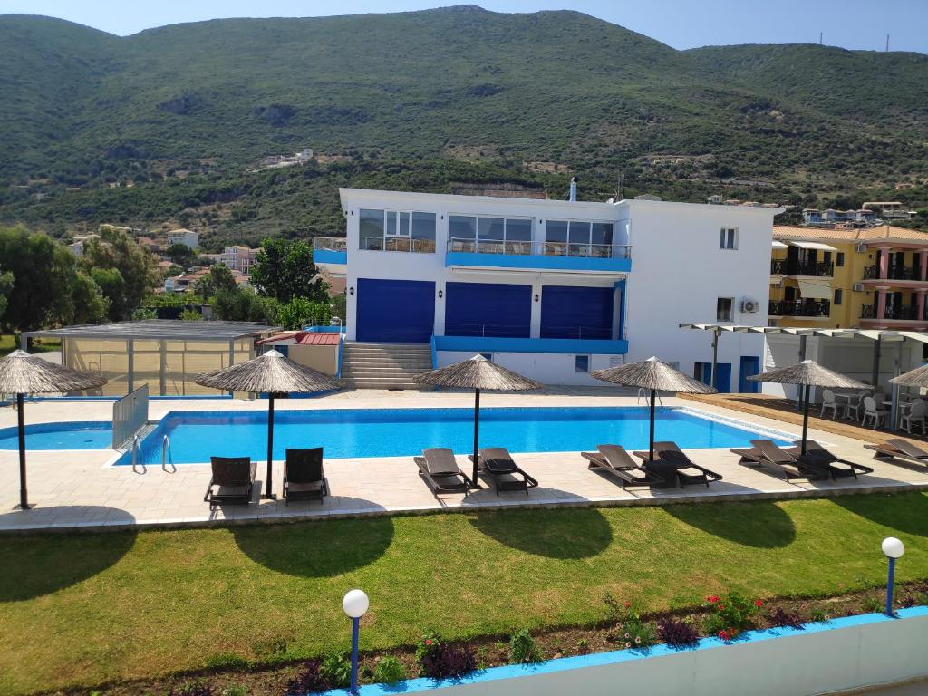 an image of a villa with a swimming pool at Surf Hotel in Vasiliki