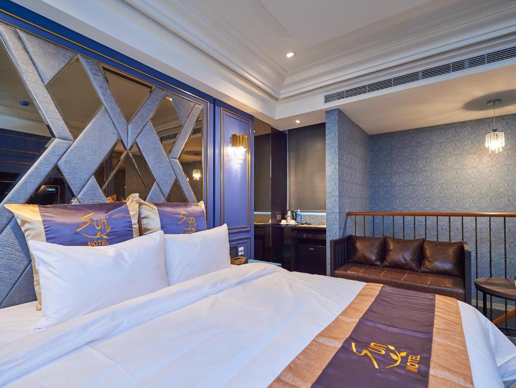 Postel nebo postele na pokoji v ubytování Sun Motel