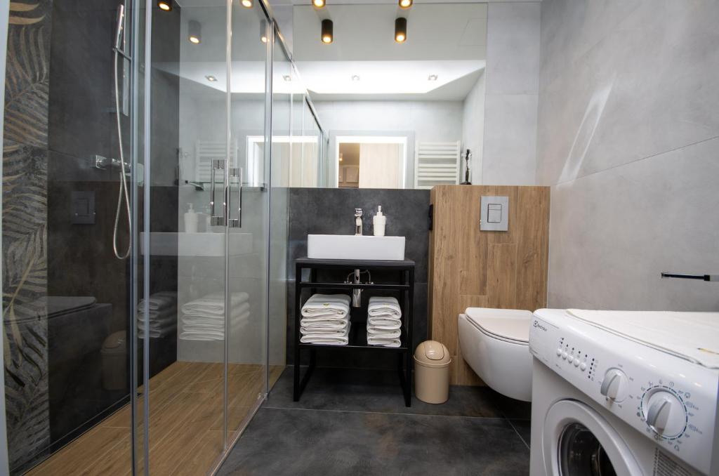 Kúpeľňa v ubytovaní InPoint Apartments G11 near Old Town & Kazimierz District & Parking Option