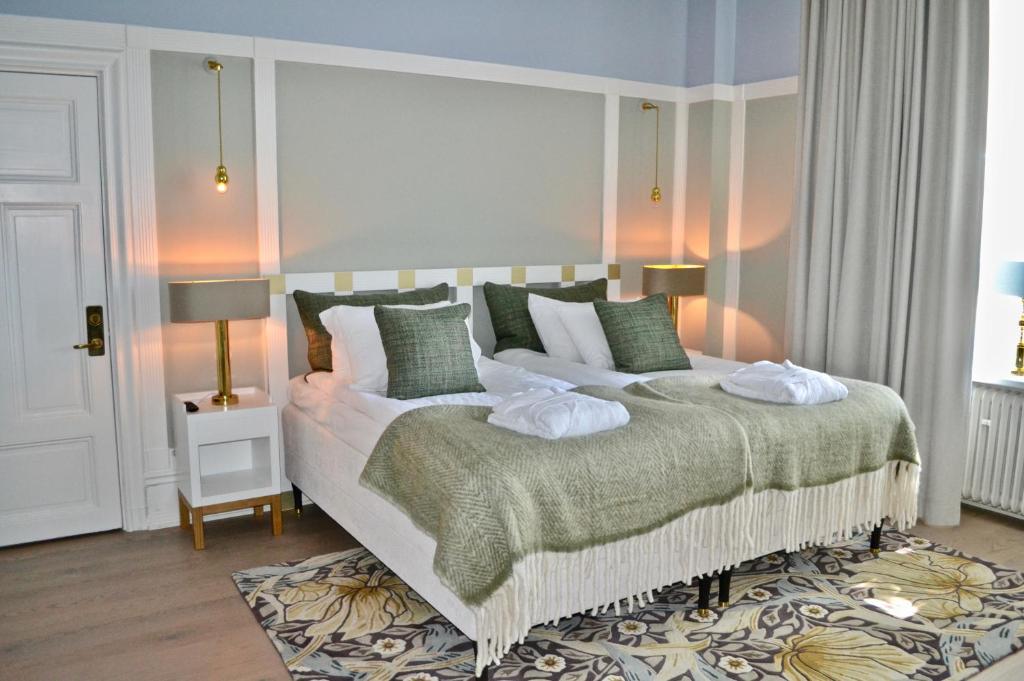 Postel nebo postele na pokoji v ubytování Grand Hotel Saltsjöbaden