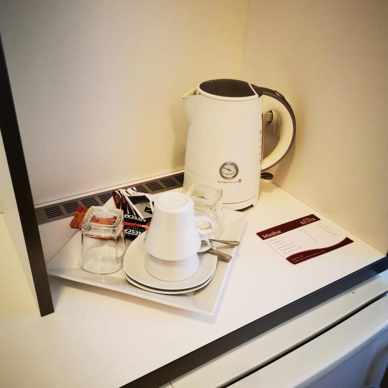 Příslušenství pro přípravu čaje a kávy v ubytování Hotel RICHTR