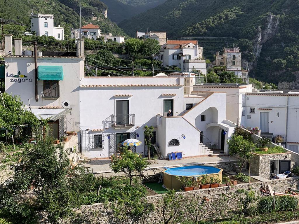 a group of white houses on a mountain at Villa La Zagara in Minori