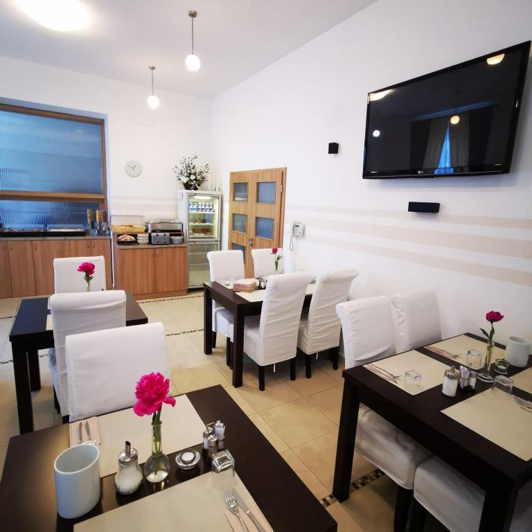 TV a/nebo společenská místnost v ubytování Hotel RICHTR
