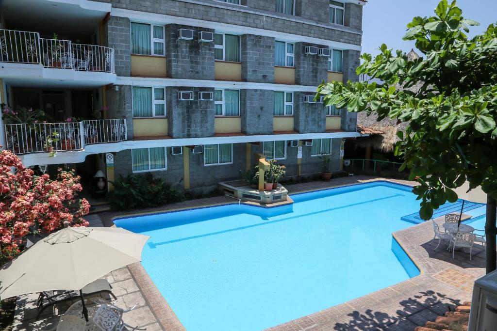 Bazén v ubytování Vallartasol Hotel nebo v jeho okolí