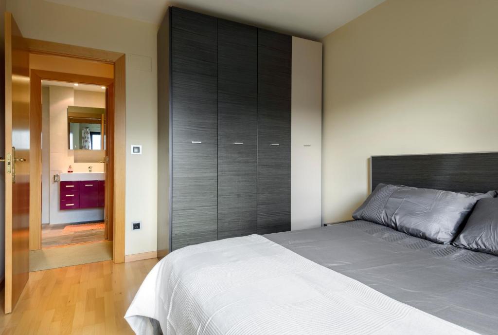 Postel nebo postele na pokoji v ubytování Peña Sabocos, apartamento turístico Panticosa