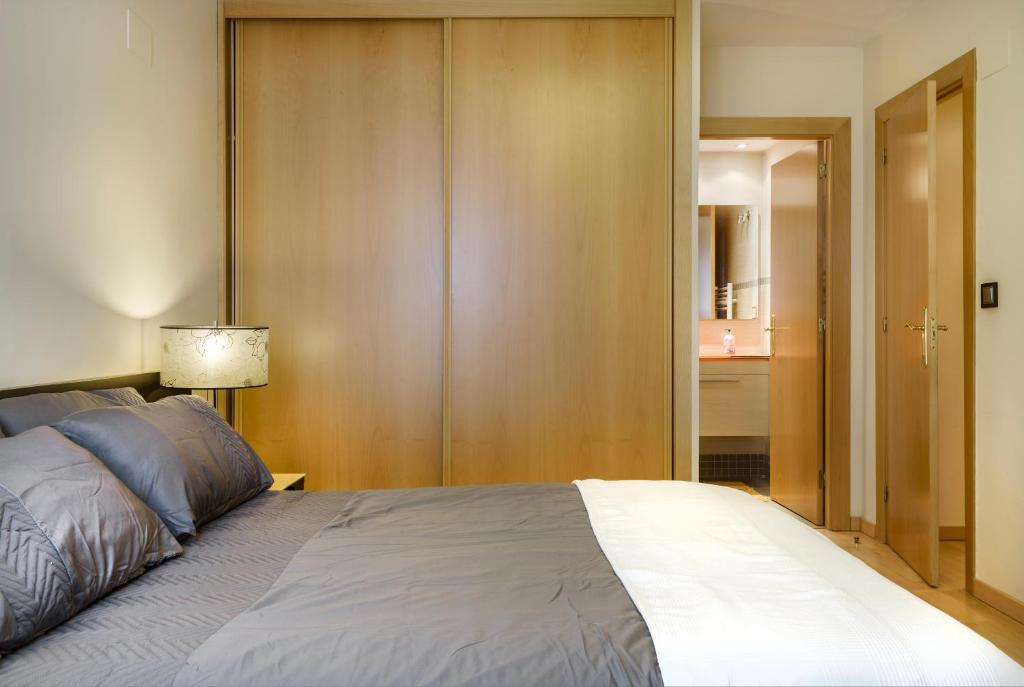 Postel nebo postele na pokoji v ubytování Peña Sabocos, apartamento turístico Panticosa
