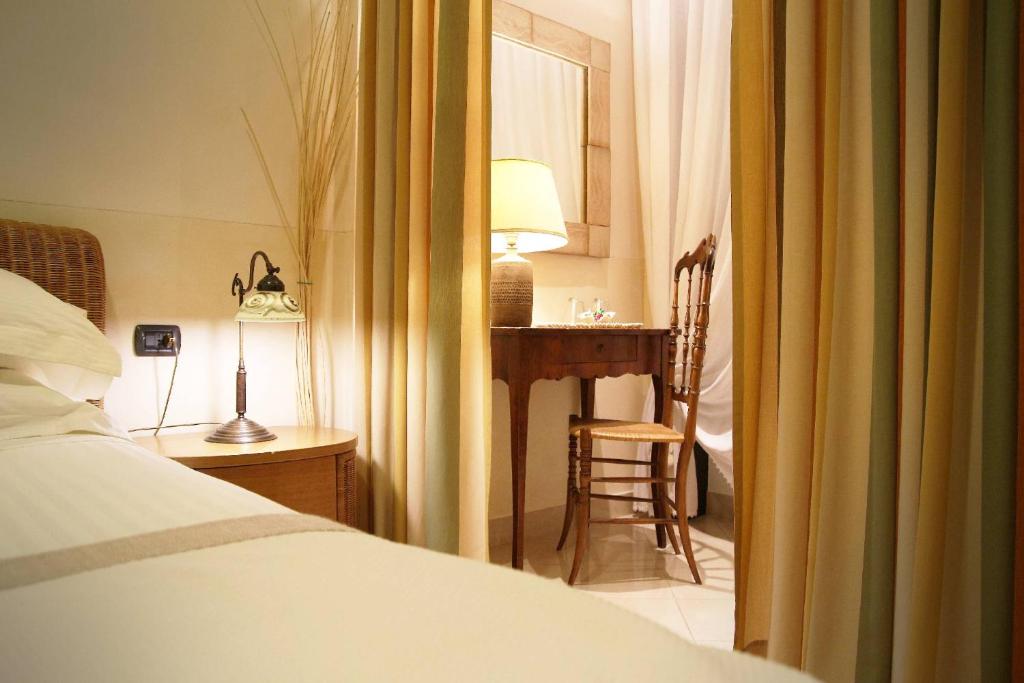 Cama ou camas em um quarto em Locanda A Cà Du Gigante