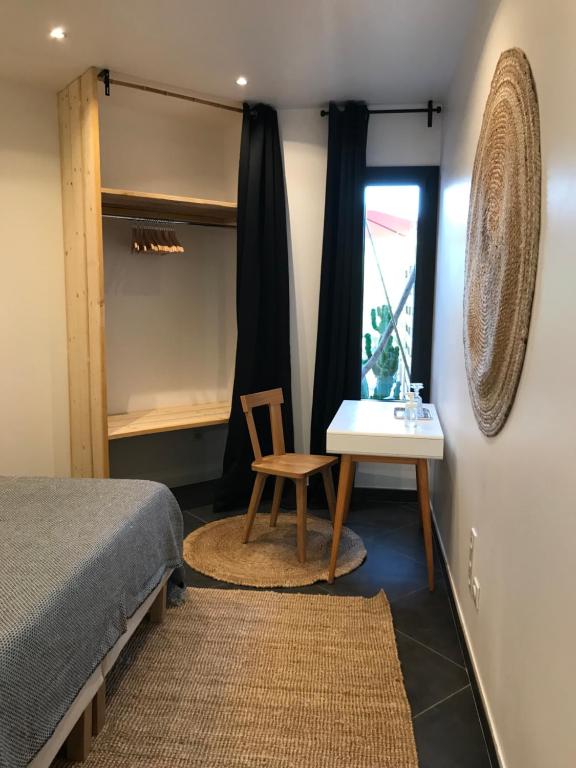 Villa le sud appartementsにあるベッド