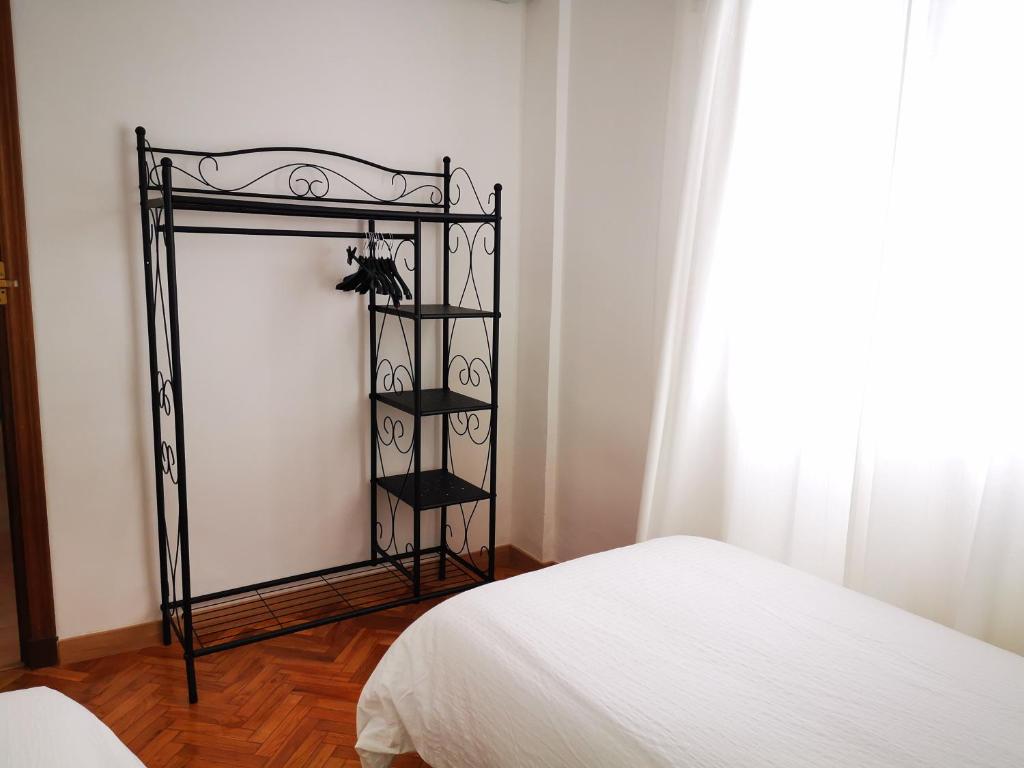 Posteľ alebo postele v izbe v ubytovaní Apartamento bonito y bien ubicado en el Soho de Málaga.