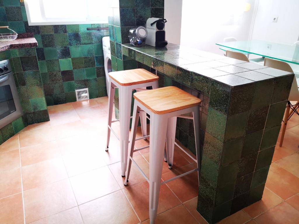 Kuchyňa alebo kuchynka v ubytovaní Apartamento bonito y bien ubicado en el Soho de Málaga.