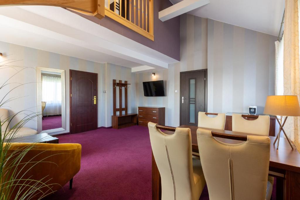TV a/nebo společenská místnost v ubytování Hotel Jan