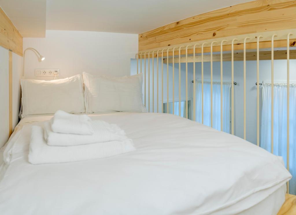 A bed or beds in a room at SanTelmo27A