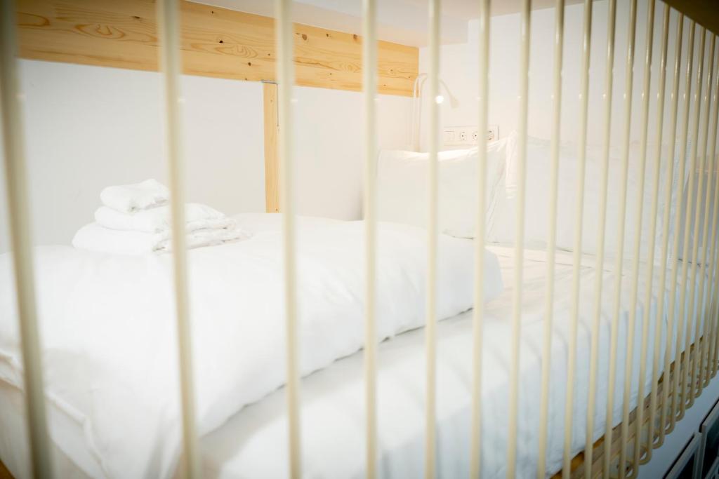 A bed or beds in a room at SanTelmo27A