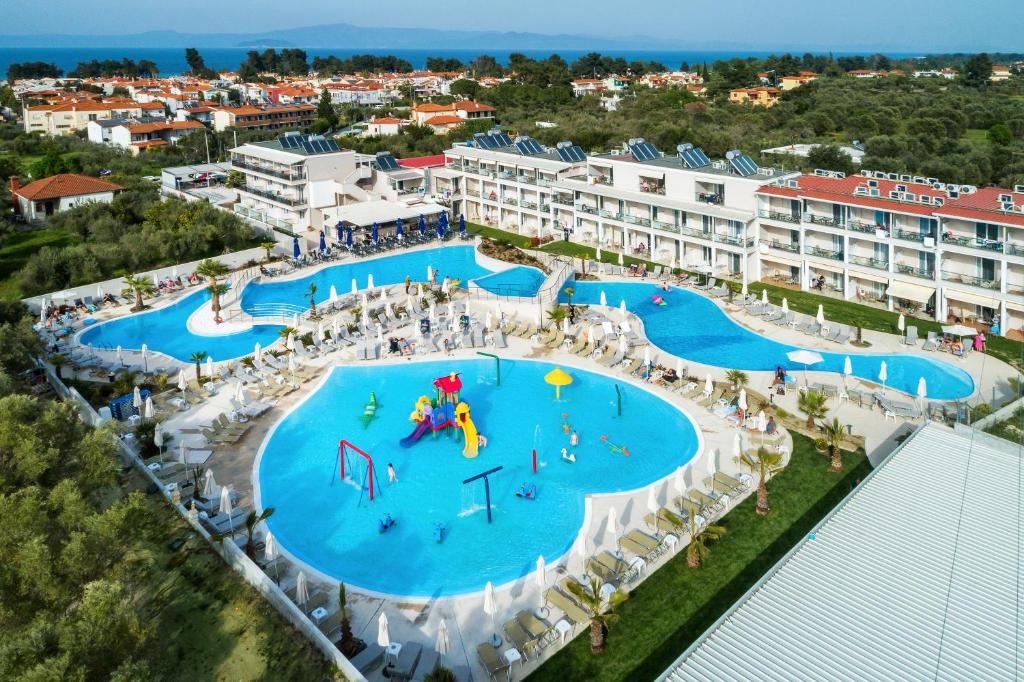 an aerial view of a swimming pool at a resort at Anna Hotel in Pefkochori