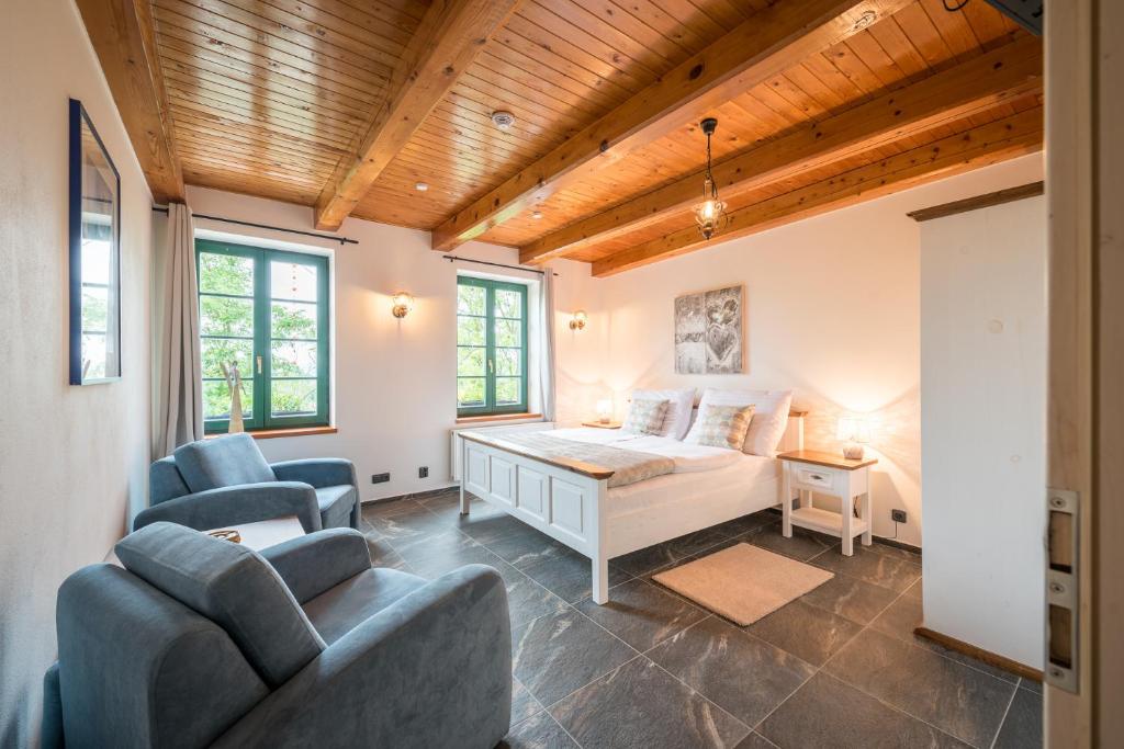 Postel nebo postele na pokoji v ubytování Vinařství Vrátil - penzion