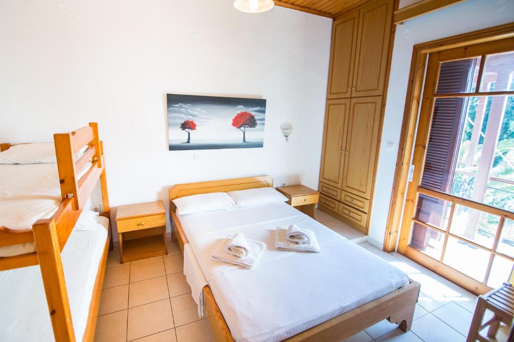 Posteľ alebo postele v izbe v ubytovaní Margarita Apartments