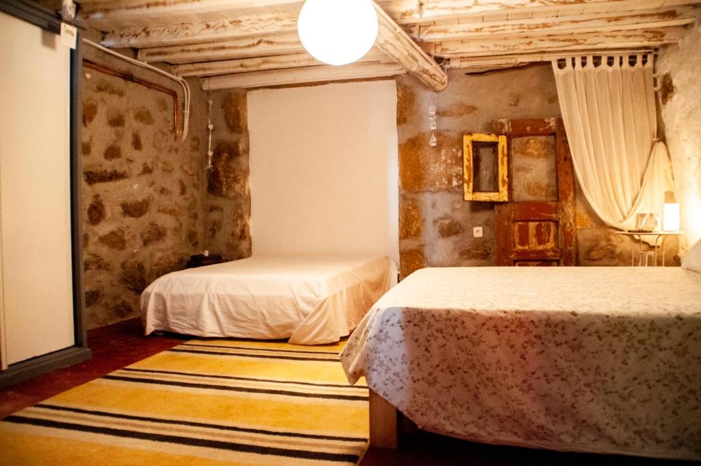 Postel nebo postele na pokoji v ubytování Quintinha Viçosa