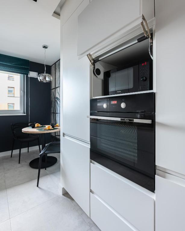 Kuchyňa alebo kuchynka v ubytovaní P&O Serviced Apartments MORDOR