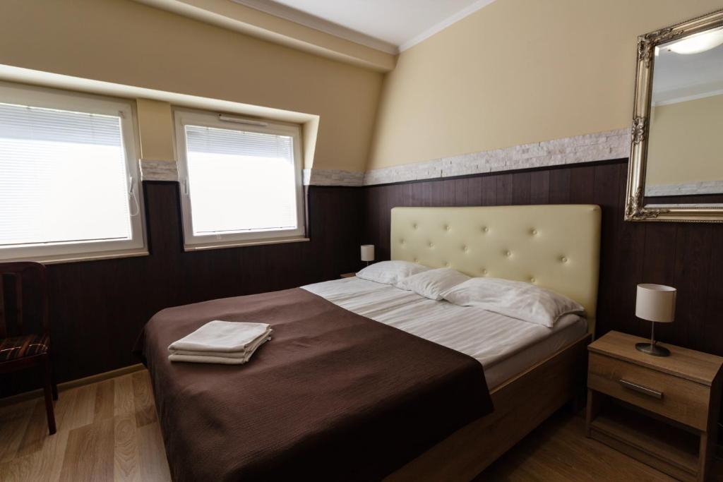 Posteľ alebo postele v izbe v ubytovaní Bella Villa