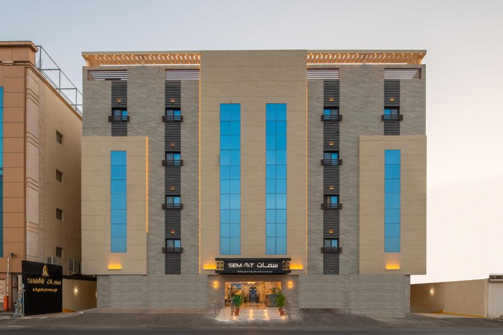 a rendering of a building with blue windows at Semat ApartHotel in Jeddah